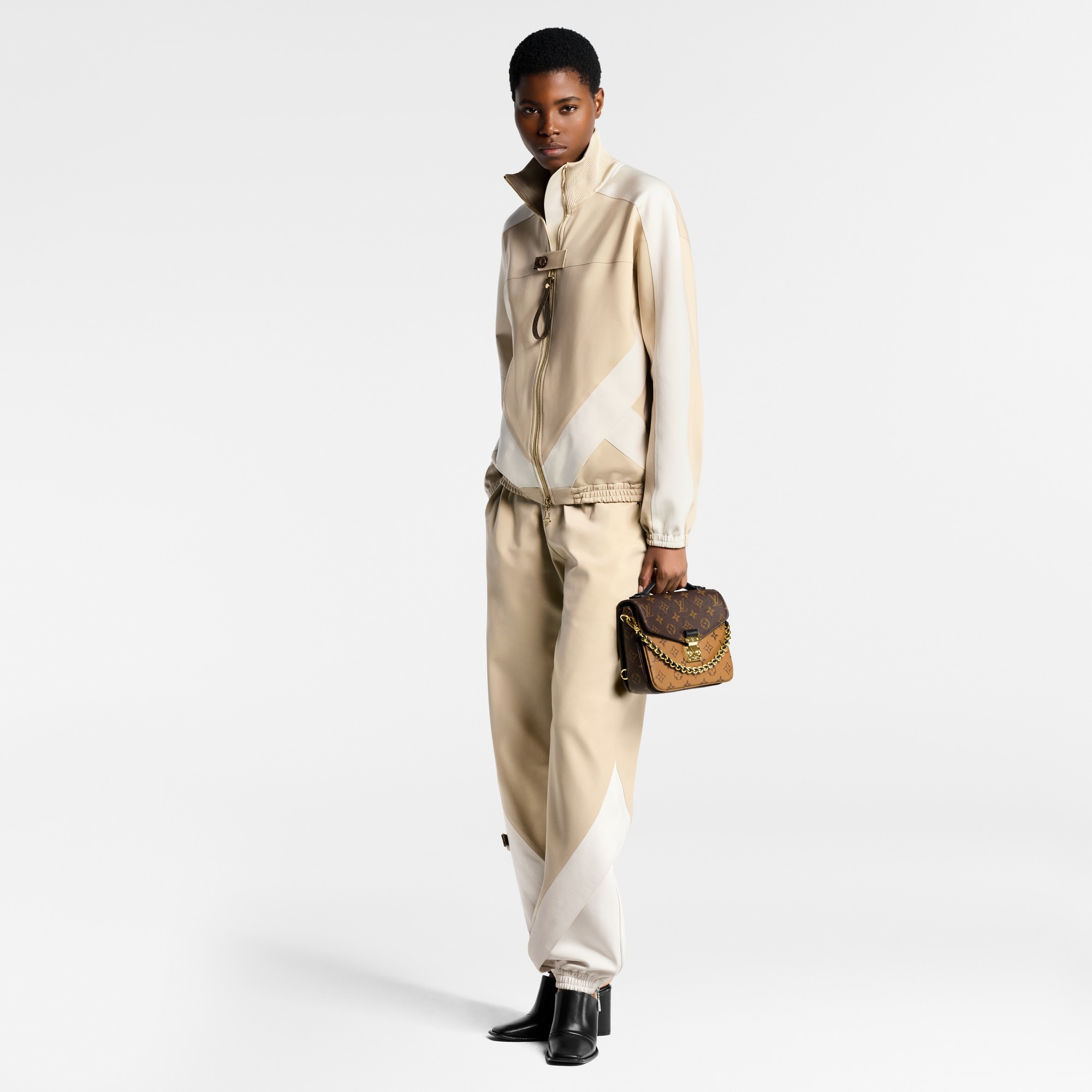 Pochette Métis Backpack Monogram Reverse Canvas in Women