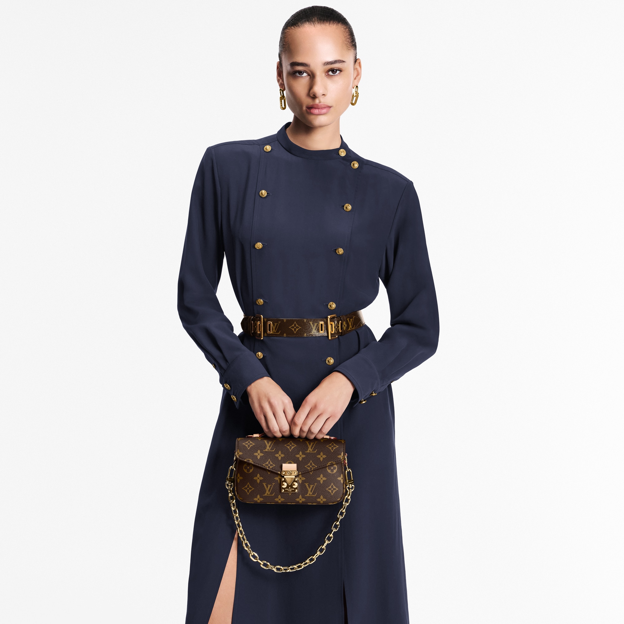 Pochette Métis East West Monogram Canvas in Women