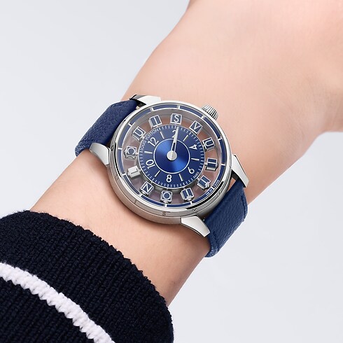 Tambour Spin Time Air, Automatic, 42.5mm, White gold ambiance view